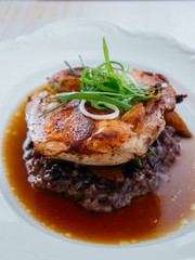 Grilled Chicken spicy breast with brown Risotto in broth