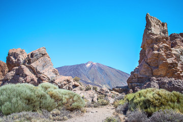 View of Volcano  El Teide   with volcanic rocks in The National Park of Las Canadas del Teide. Best place to visit  and walk in Tenerife Canary Islands Spain.