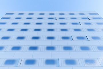 Fototapeta na wymiar Wall of steel and toned blue glass