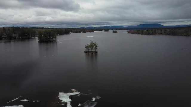 Baxter State national park in Millinocket, USA with its frozen , chilly but clear water plane in subzero temperatures and floating ice.