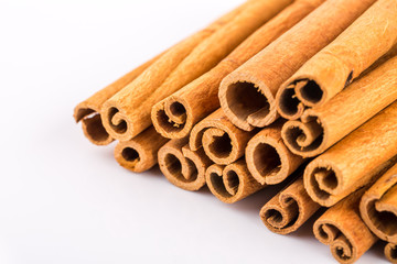 Obraz na płótnie Canvas Closeup of cinnamon on white