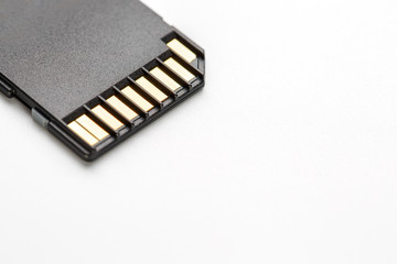 Black SD memory card on a white background, isolate