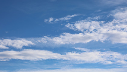 wide angle blue sky with white clouds