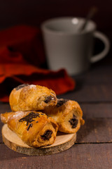 Three mini croissants with chocolate