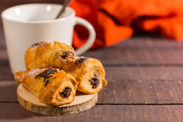 Three mini croissants with chocolate