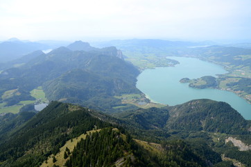 Naklejka na ściany i meble View of Lake Mondsee in the Austrian region Salzkammergut seen from Schafberg