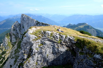 Hikers having a rest on Mount Schafberg in the Austrian region Salzkammergut