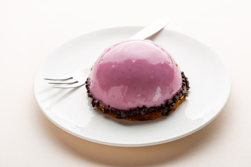 Mousse pink cake on plate