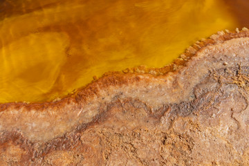 Acid bubbling pond in the Danakil depression in Ethiopia in Africa.