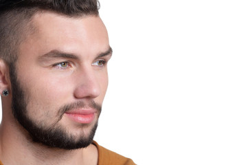Fototapeta premium Portrait of handsome young man on white background