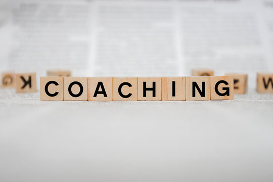 Coaching Word Written In Wooden Cube