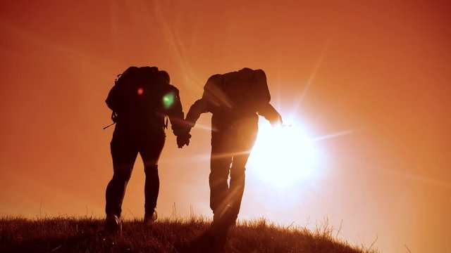 happy family teamwork business travel concept. couple silhouette jump happiness husband and wife run holding hands tourists. man and girl hikers tourists concept happiness love lifestyle friendship a