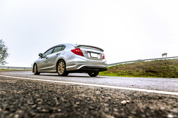 Fototapeta premium Photo taken on Drive car the serpentine road in north thailand