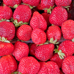 fresh raw strawberries top view close up, red fruit background