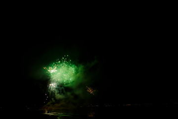 firework on black background for celebration party on the beach. at phuket thailand merry christmas and happy new year.