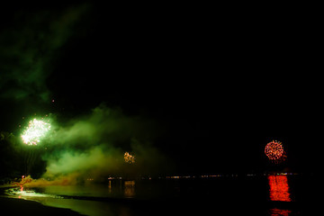 firework on black background for celebration party on the beach. at phuket thailand merry christmas and happy new year.