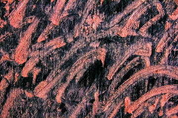 pink semicircular lines diagonally drawn on black background with chalk