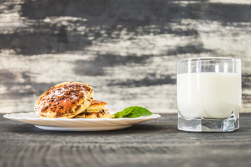 sweet pancakes and a glass of milk