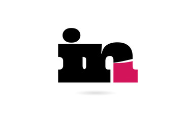 in i n pink and black alphabet letter combination logo icon design