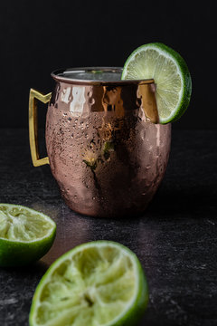 Icy cold Moscow Mule mixed drink in copper mug for cocktails