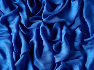 Silk satin fabric texture background.