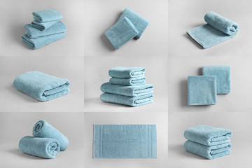 Basket of fresh towels on grey background