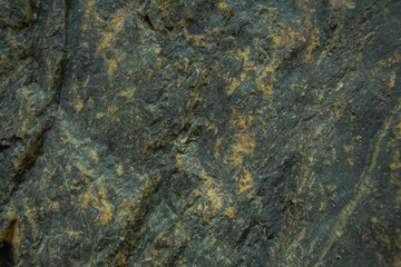 Background and black marble. Bedrock Stone In the forest near the waterfall