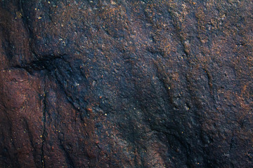 Background and black marble. Bedrock Stone In the forest near the waterfall