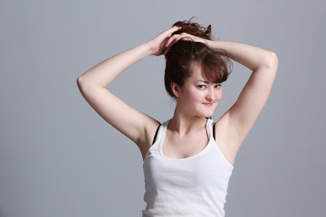 Beautiful girl playing with her hair