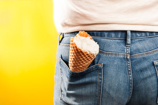 ice cream cone in the back pocket of jeans