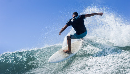 surfer waves in Brazil - obrazy, fototapety, plakaty