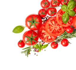 Various colorful tomatoes with  basil leaves, herbs and spices isolated on white background.  Flat lay. Top view.