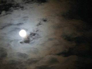 full moon at night clouds sky