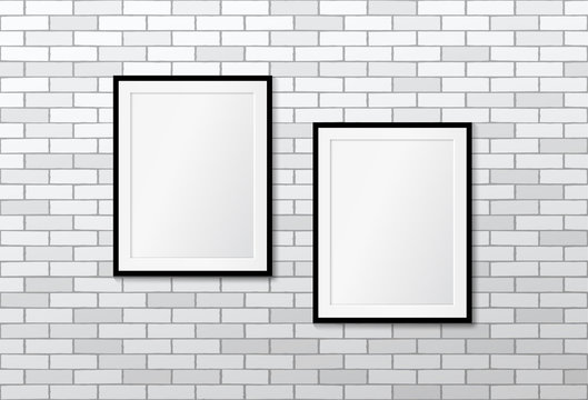 Two modern frames on white brick wall. Vector mock up. Picture frames layout