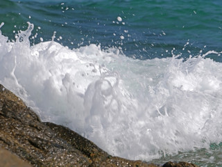 Waves crashing against the rock