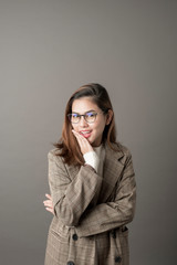 Portrait of Attractive business woman in studio grey background