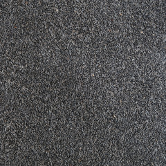 Dark grey porous texture of asphalt