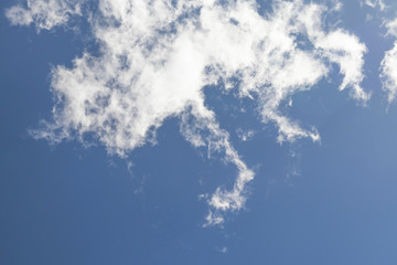 Colorful cirrus clouds on a bright sky.