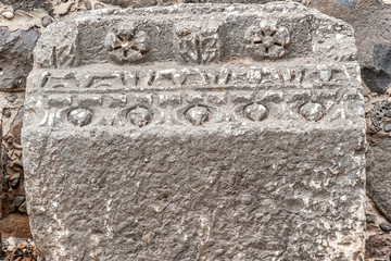 details of the decor of the ancient synagogue ruins in the city of Capernaum, the birthplace of St. Peter.