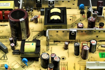 Capacitors and other components in an electronic board