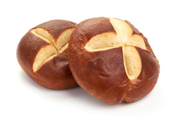 Traditional German laugenbrot. Bavarian homemade bretzel rolls lye bread, close-up, isolated on white background