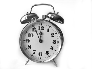 Five to twelve on alarm clock. Deadline concept