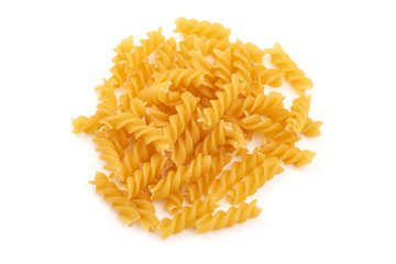 Raw fusilli pasta, close-up, isolated on white background