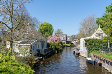 Fototapeta na wymiar Small river in Broek in Waterland, The Netherlands