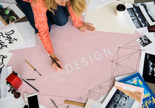 Creative Person Drawing on a Paper Mockup