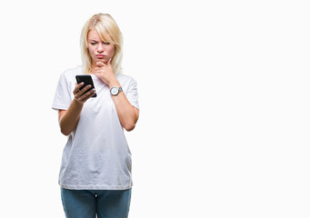 Fototapeta premium Young beautiful blonde woman using smartphone over isolated background serious face thinking about question, very confused idea