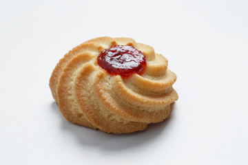 Close-up of one shortbread cookie isolated on white background.
