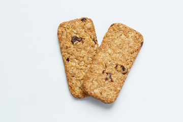 Two multigrain cookies. High angle view of two multigrain cookies isolated on white background.