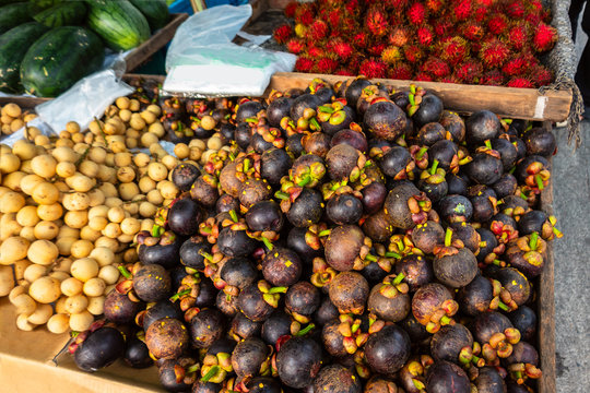 Open air fruit market in the village in Thailand