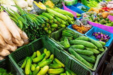 Farmers market with various domestic colorful fresh fruits and vegetable. Tasty colorful mix.